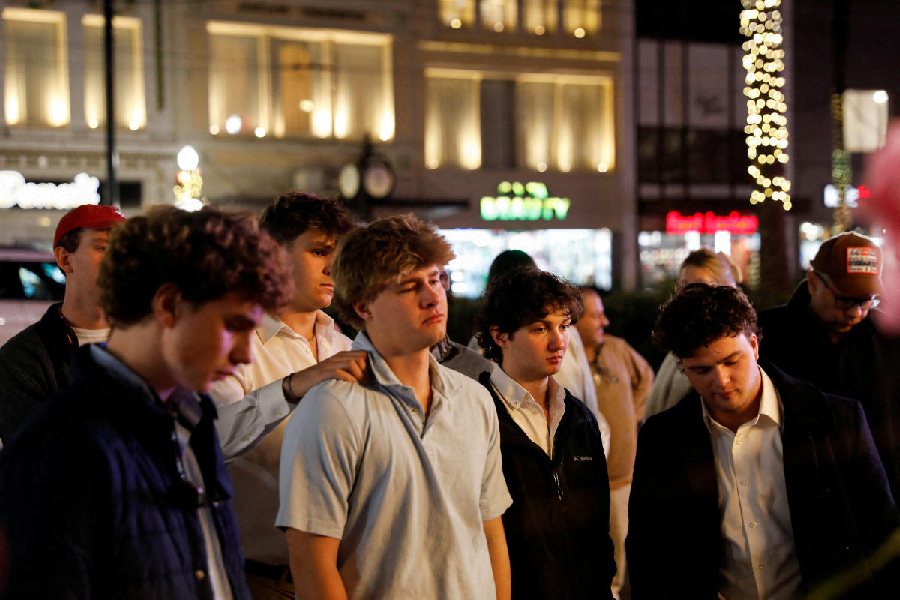 A group of boys lament the untimely passing of their friend. 