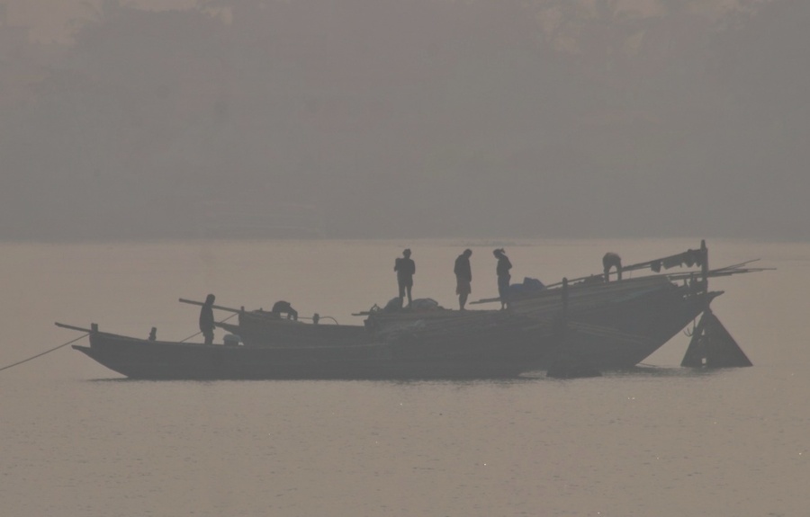 Fishing trawlers on the Hooghly get busy on a foggy Saturday morning 