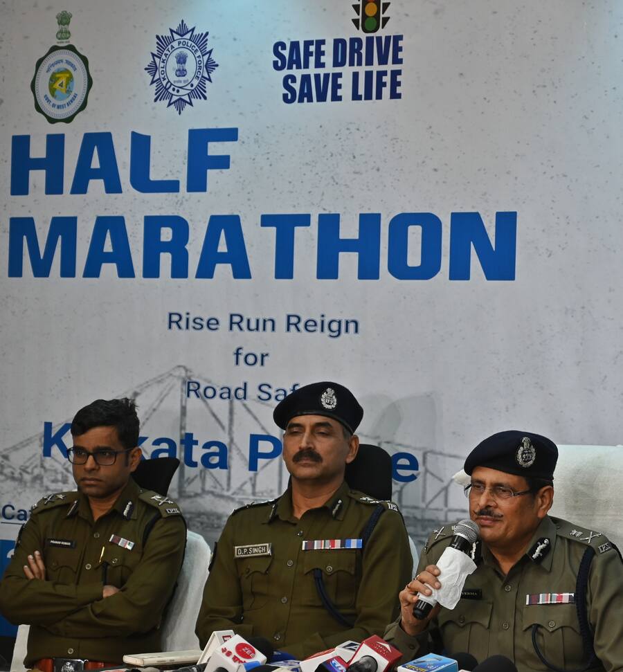 Kolkata police commissioner Manoj Varma, along with additional commissioners of police, Pranav Kumar and DP Singh, launch the Safe Drive, Save Life 2025 Half Marathon official website and registration portal at the traffic conference room in Lalbazar on Monday