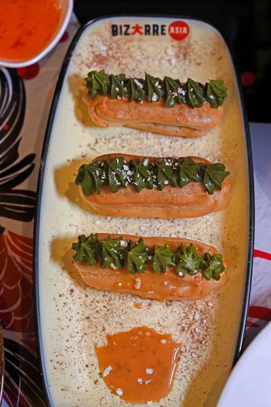 From the dessert spread, we opted for Matcha Frosted Eclairs. The eclair is topped with a mildly sweet matcha cream with caramel oozing from the centre with each bite. The caramel surprise after the crunch, replacing the chocolate, elevated the classic dessert