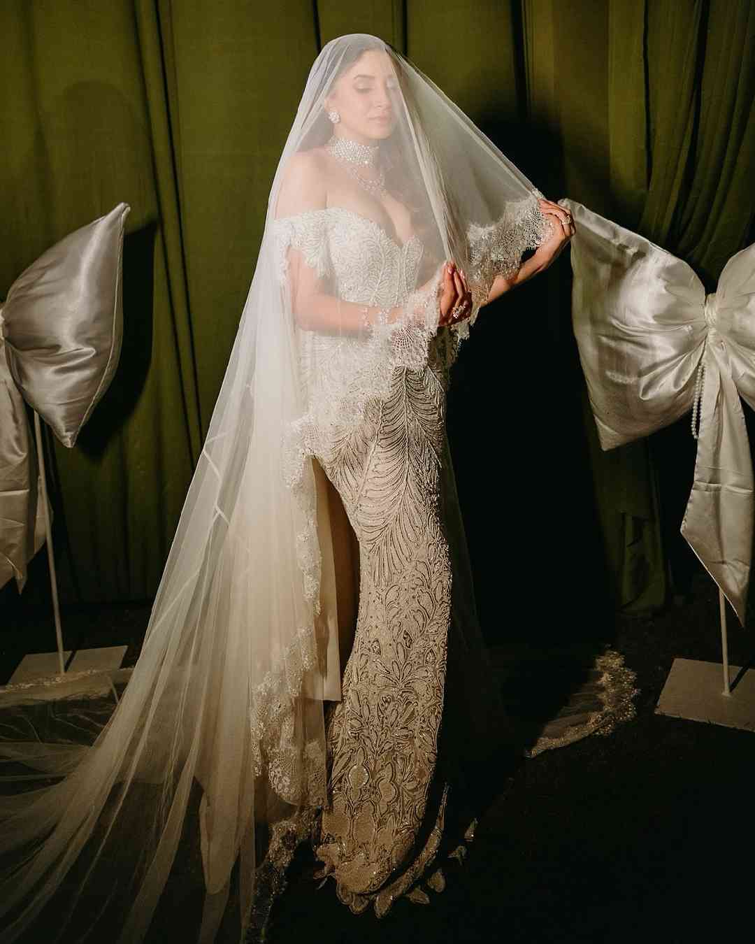 Aashna Shroff posed with an intricately embroidered tulle veil. 