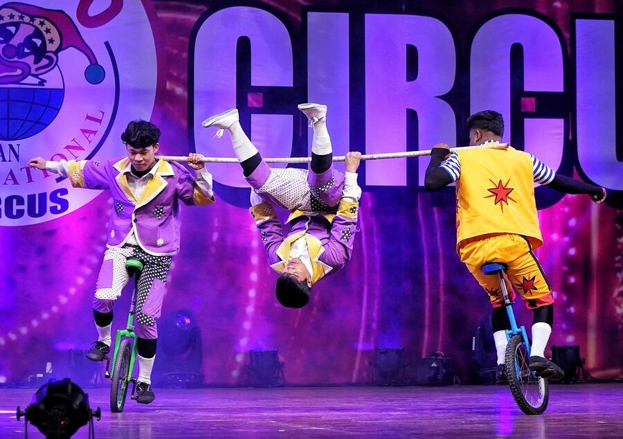 A group of cyclists pedalling around the stage performing stunts won a big round of applause