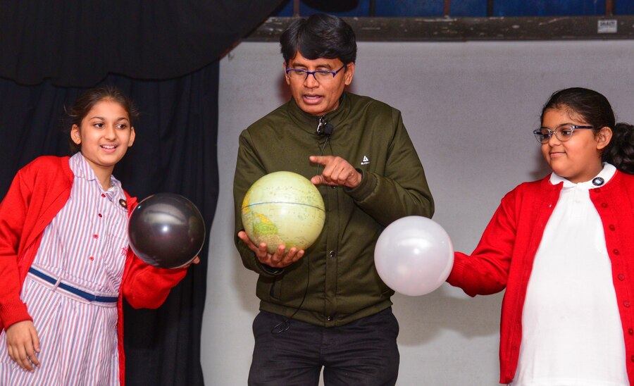 Students from Modern High School for Girls take part in a science demonstration lecture on eclipses at Birla Industrial & Technological Museum in Ballygunge on Monday