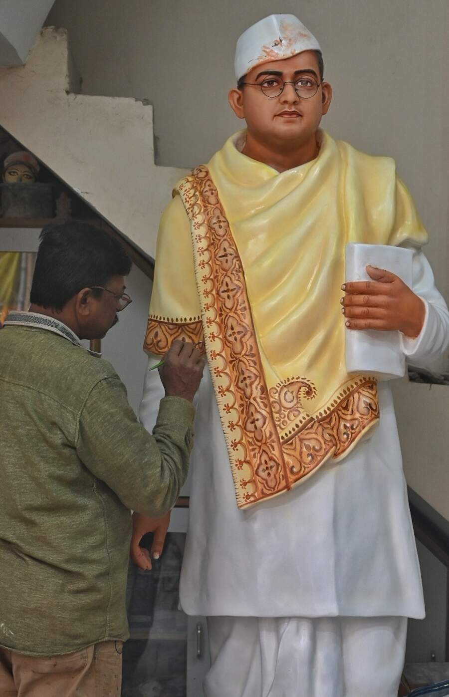 A Kumartuli artist works on a statue of Netaji Subhas Chandra Bose on Tuesday ahead of his birth anniversary on January 23
