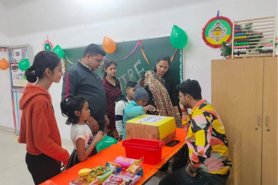 The campus resonated with laughter and camaraderie as students bonded with peers and teachers, enjoying the fair's diverse attractions.