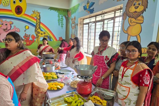 The teachers and students joined hands to prepare the sacred bhoga.