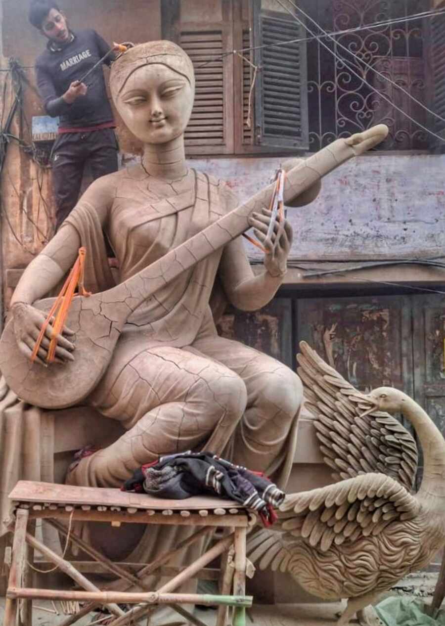 With only 18 days left for Saraswati Puja, Kumartuli artists prepare idols of the Hindu goddess of knowledge. This year, Saraswati Puja will be celebrated on February 2 