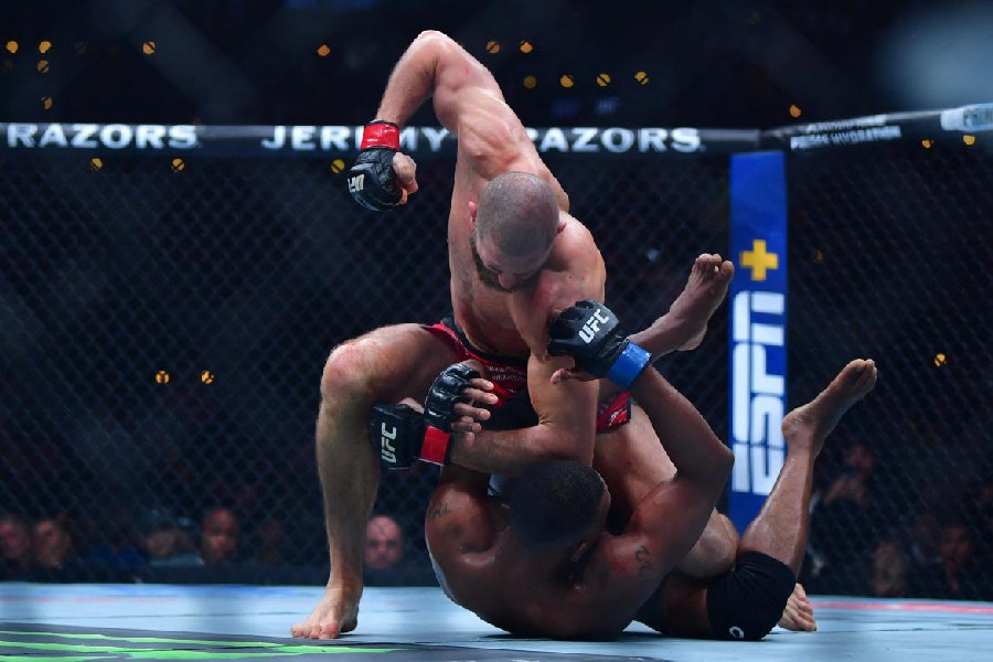 As Hill struggled on the ground, the Czech fighter rained punches on him, ultimately winning the match via KO.