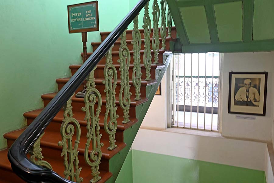 The main staircase with polished wooden railings forms a prime position in the 38/2, Elgin Road, house and divides the galleries of the museum and the erstwhile private rooms of the various members of the Bose family