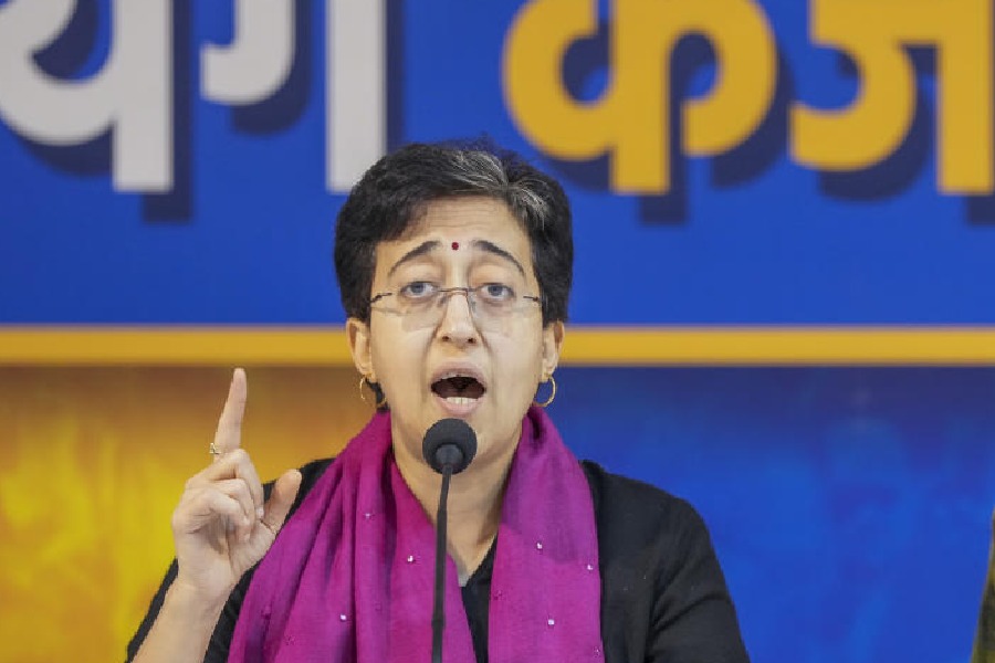 Delhi chief minister Atishi and her Punjab counterpart Bhagwant Mann at a press conference, in New Delhi, Friday, Jan. 24, 2025.