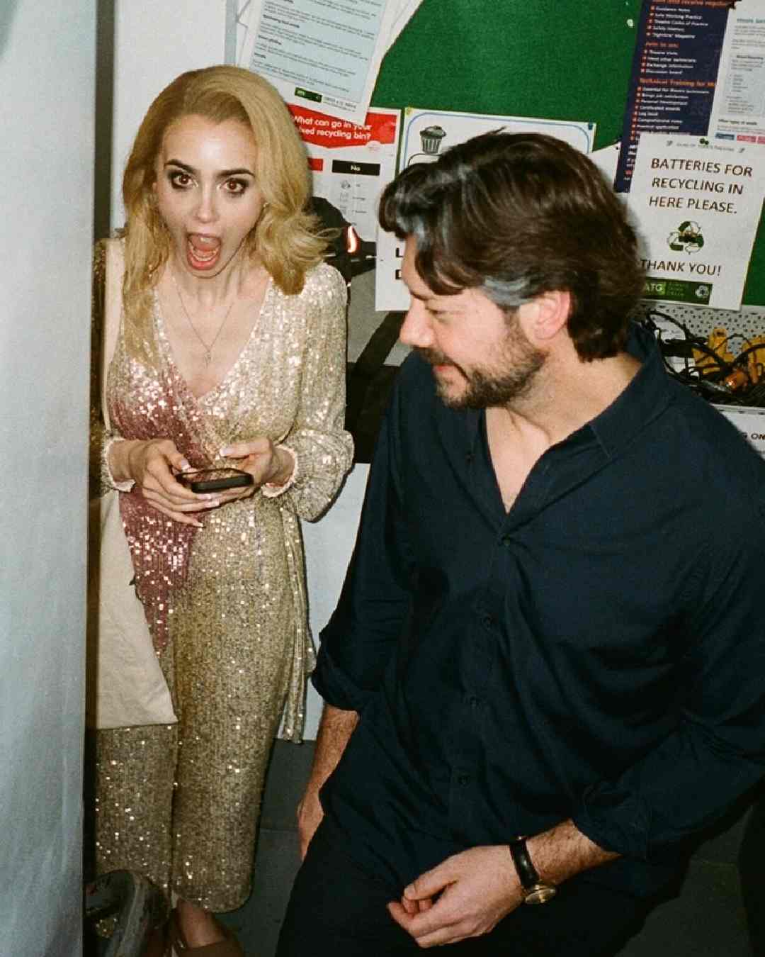 A candid photo shows Collins making a funny face while Morte climbs the theatre’s staircase.  