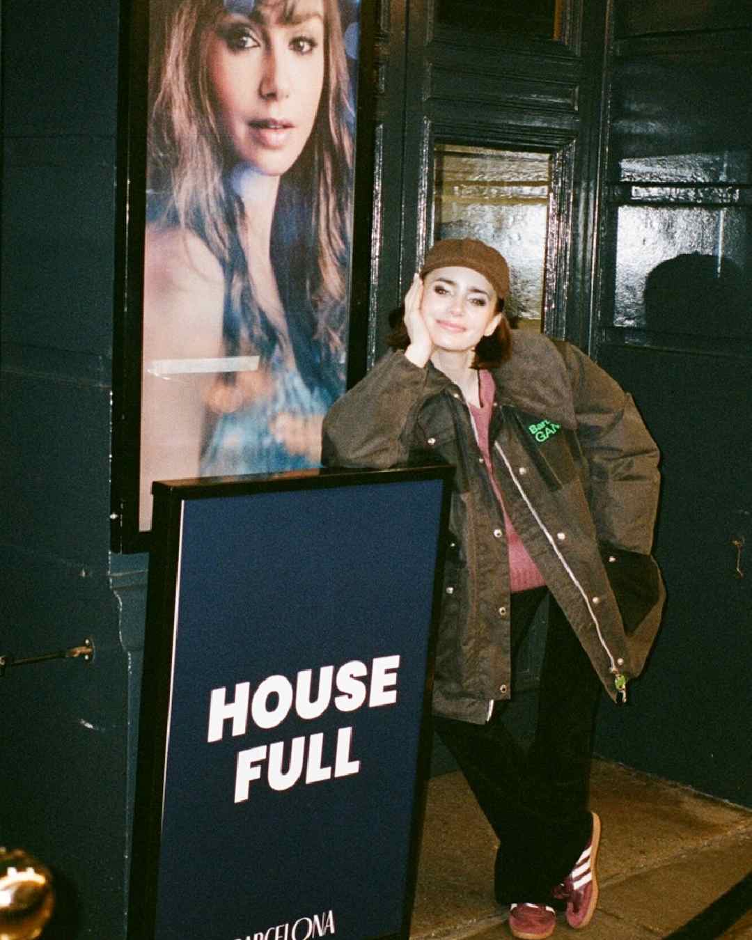 Emily in Paris star Lily Collins posed with a ‘houseful’ board outside the theatre. 