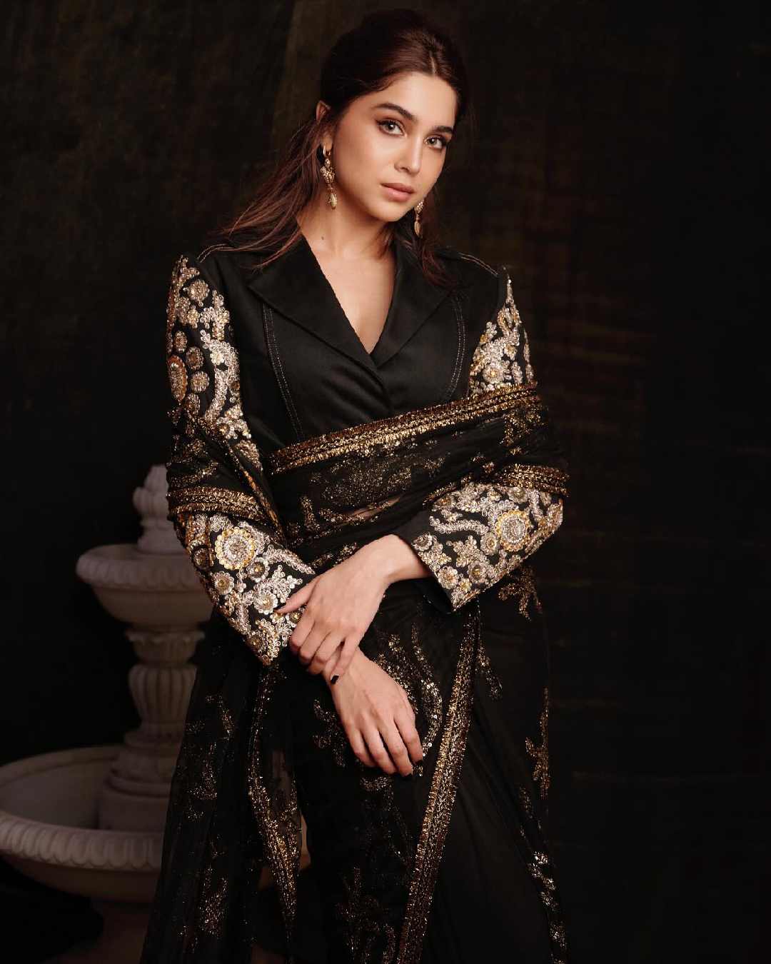 Alia’s Alpha co-star Sharvari Wagh followed in her footsteps, draping a black sari over an intricately embroidered blouse. 