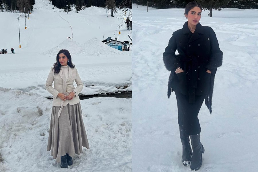 Bhakshak actress Bhumi Pednekar trudged through the snow-covered landscape of Switzerland. She sported a blazer, a turtleneck top, a pleated skirt and snow boots.