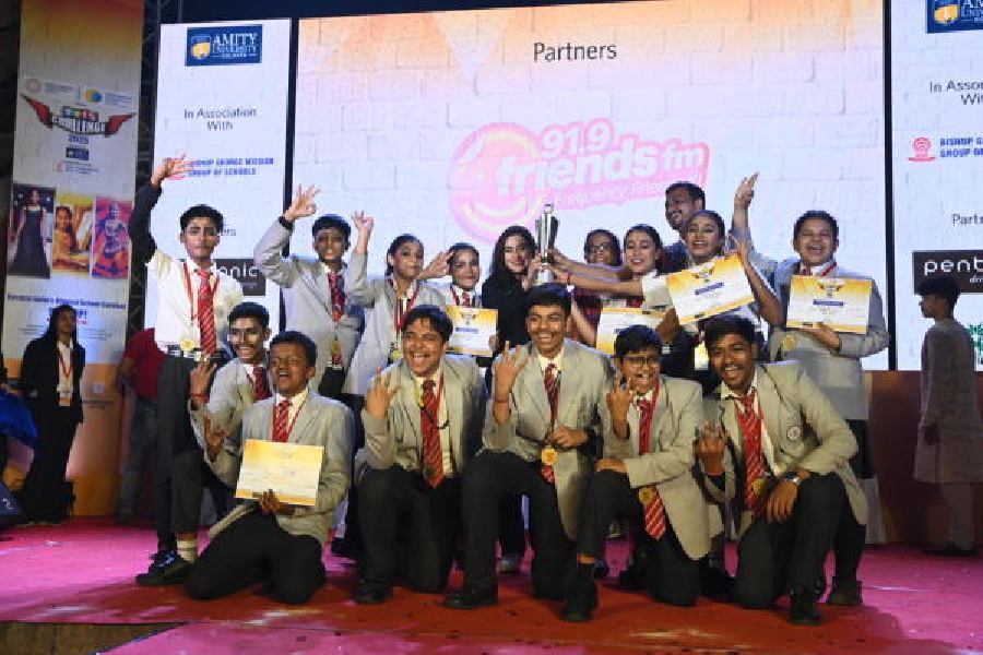 The students of Griffins International School Kharagpur with the Champion of Champions School trophy on Saturday