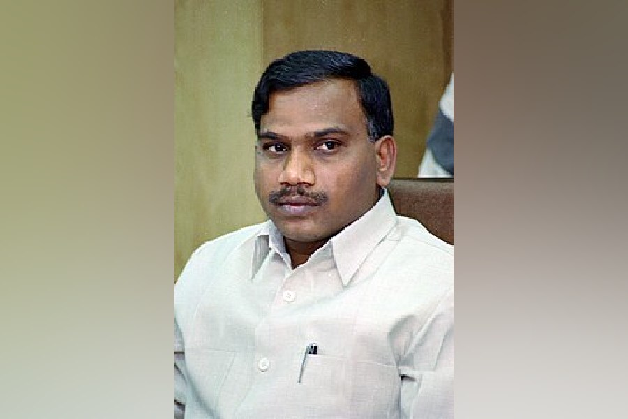 Members of the Joint Parliamentary Committee share a light moment after a meeting on the Waqf Amendment Bill, in New Delhi, Wednesday, Jan. 29, 2025