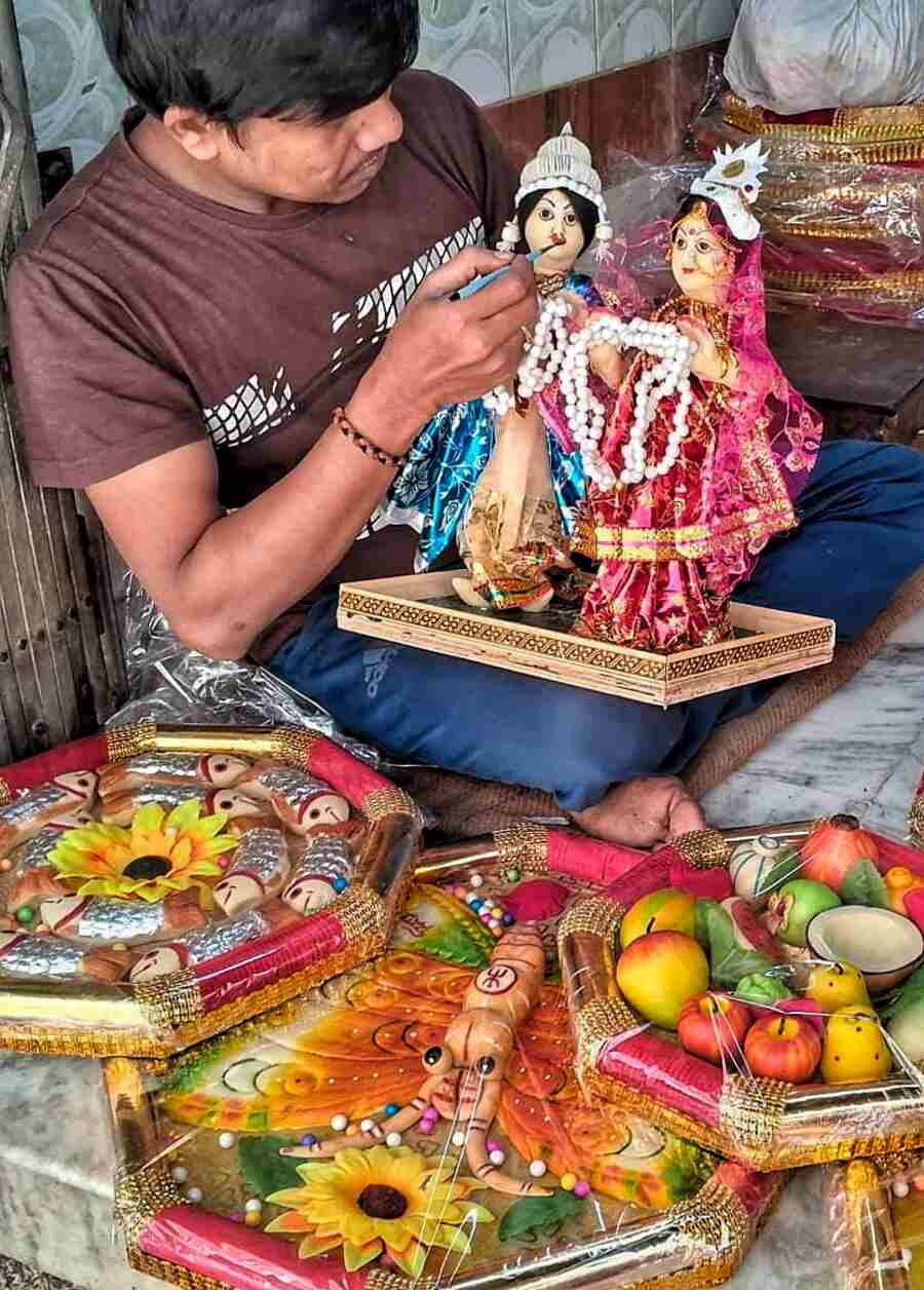 Wedding sweets being readied at Khudiram Sweets in north. Bride-groom dolls, fruits and butterflies made of ‘kheer’ are in demand during the wedding season 