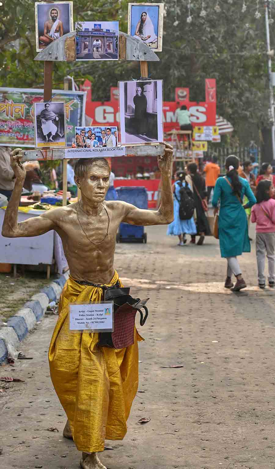 A ‘bohurupi’ artist from North 24-Parganas district, Gopal Mandal, was seen at the book fair with a unique installation with photographs of Ishwarchandra Vidyasagar, Rabindranath Tagore, Ramakrishna Paramhansa, Sarada Devi along with inaugural day photos featuring Mamata Banerjee at the 48th edition of the Kolkata Book Fair this year