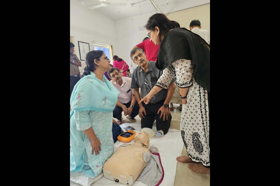 Dr Kasturi Hossain Banerjee, one of the trainers, explains a point to a batch of doctors undergoing practical CPR training