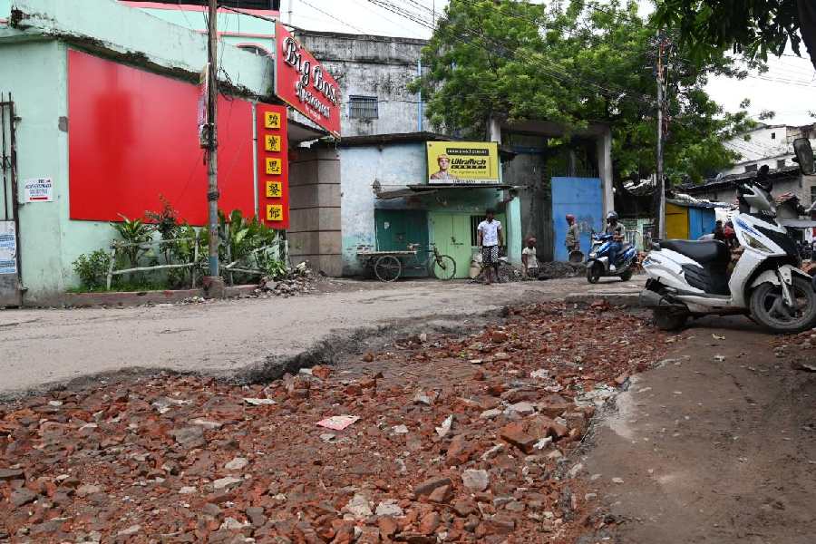 A damaged stretch of South Tangra Road on Saturday