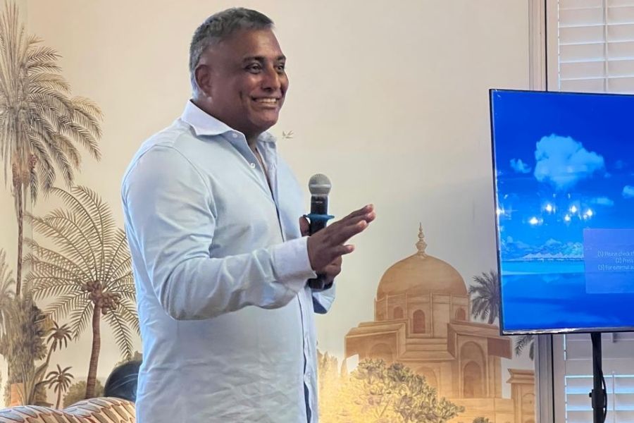 Mukherjee shares a light moment with the guests at Glenburn Penthouse