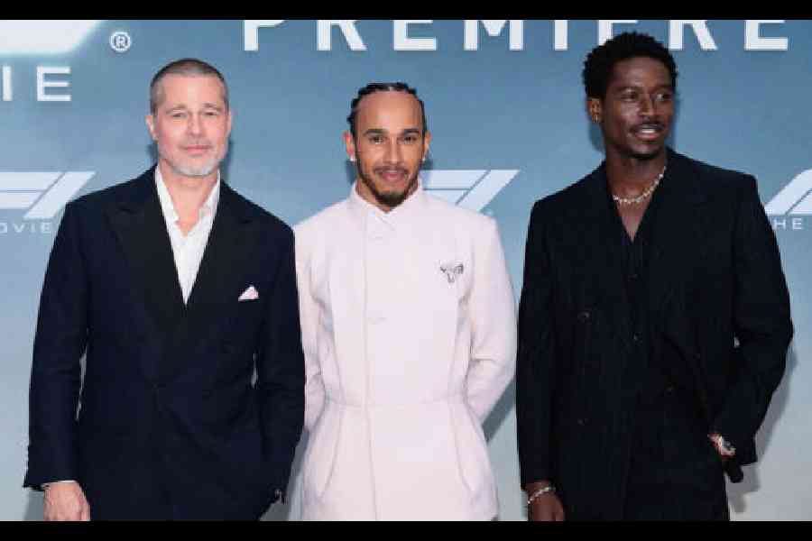 (L-R) Brad Pitt, Lewis Hamilton and Damson Idris pose at the world premiere of F1: The Movie in Times Square on June 16 in New York City. Picture: Getty Images