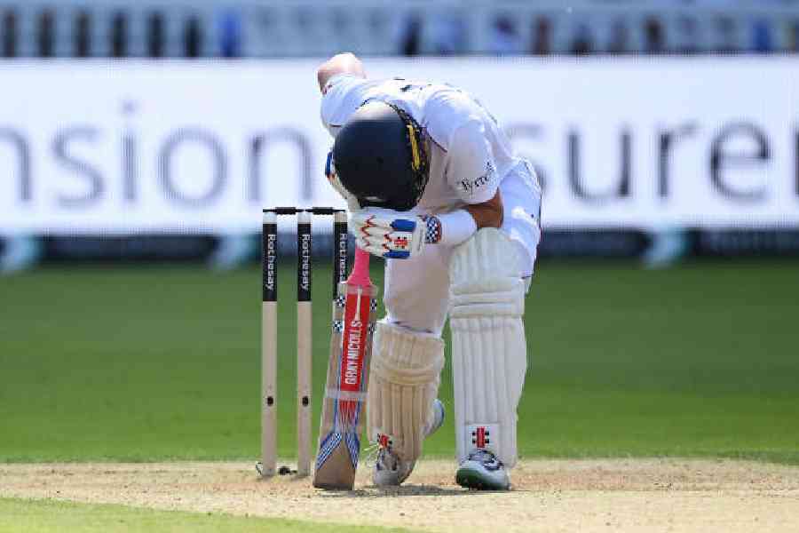 Ollie Pope, who stitched a 109-run stand with Joe Root, reacts after losing his wicket on Thursday. (Getty Images)