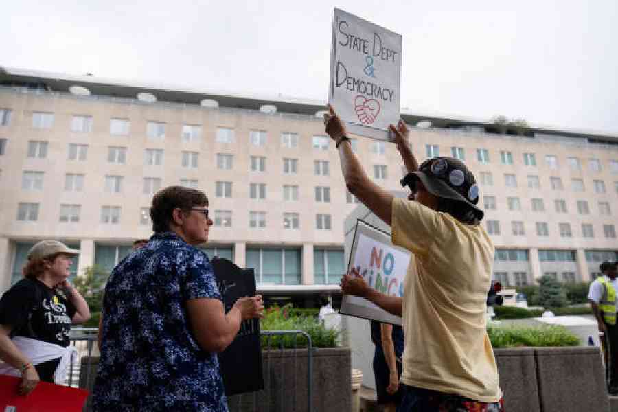 Federal workers at a rally outside the state department in Washington. (AP) 