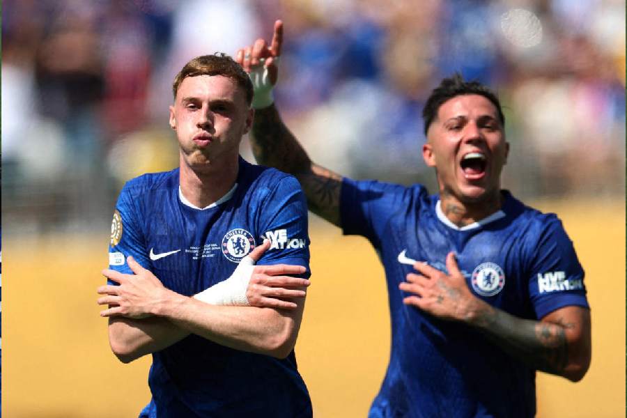  Chelsea's Cole Palmer celebrates scoring their second goal with Enzo Fernandez