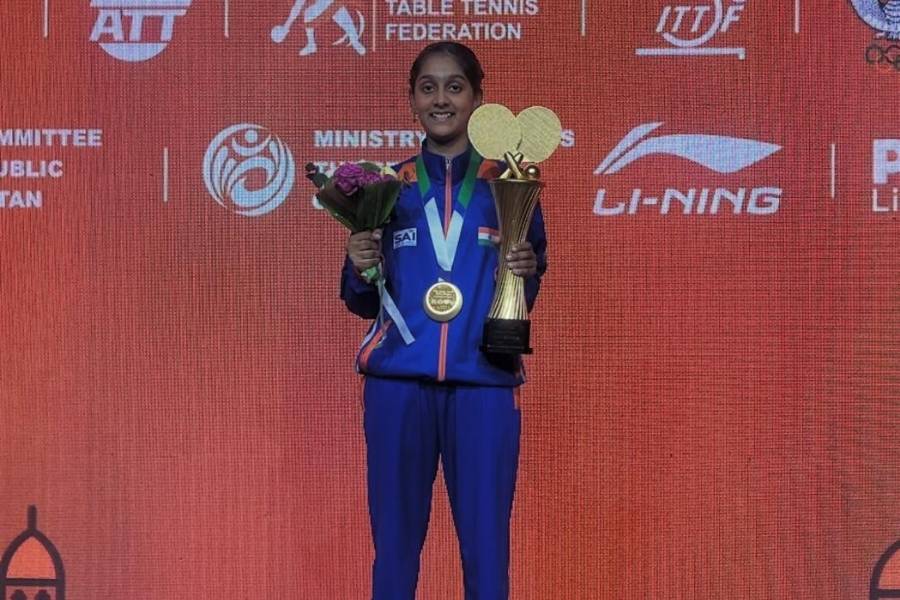 Divyanshi with the trophy and gold medal