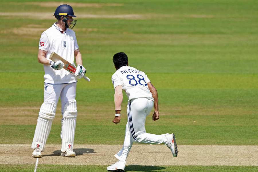 An animated Nitish Kumar Reddy celebrates after dismissing Zak Crawley at Lord’s.