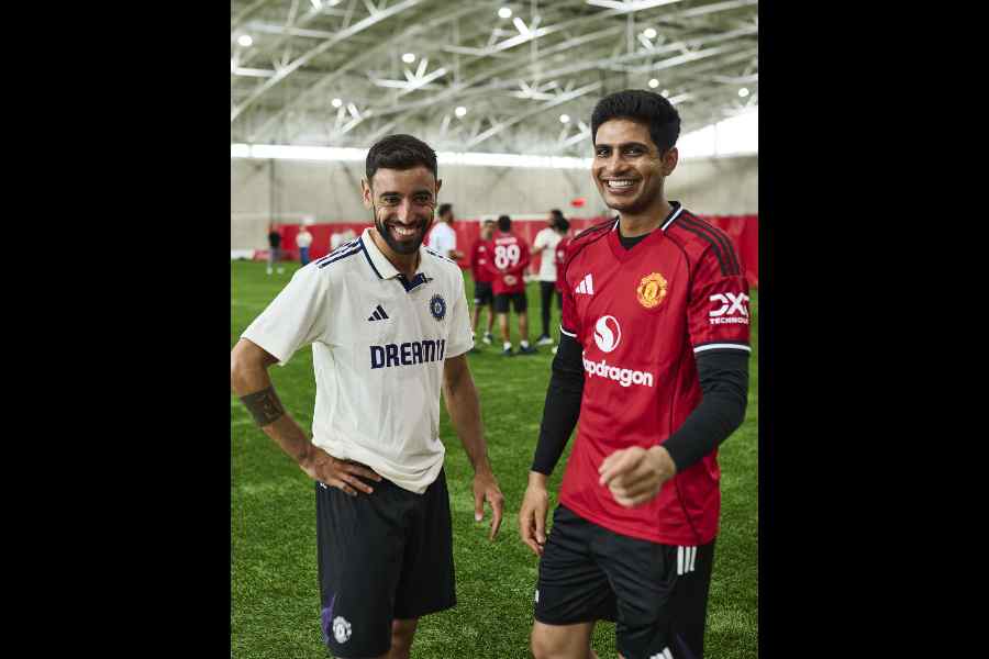 Bruno Fernandes (left) and Shubman Gill, captains of Manchester United and Team India, in Carrington on Sunday.