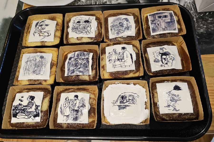 Ray’s illustrations on cakes baked at the cafe.