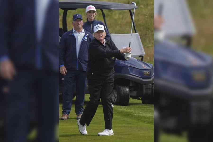 President Donald Trump plays golf at the Trump Turnberry golf course in Turnberry, Scotland