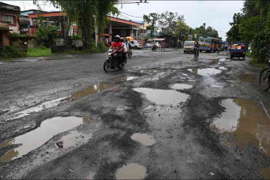 Both flanks of Taratala Road are in poor condition, seen in front of Oxygen House