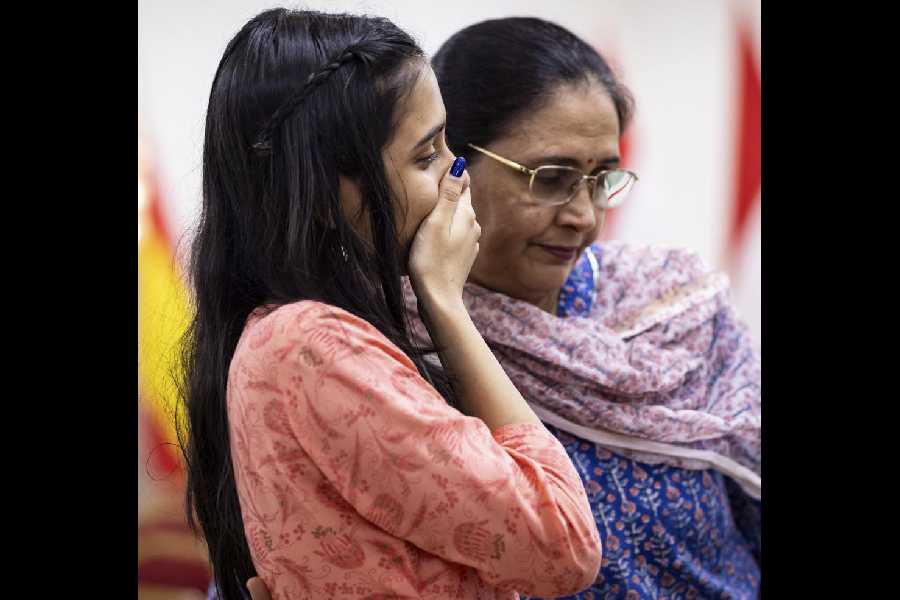 India's chess player Divya Deshmukh with her mother after winning the FIDE Women's World Cup 2025, in Batumi, Georgia.