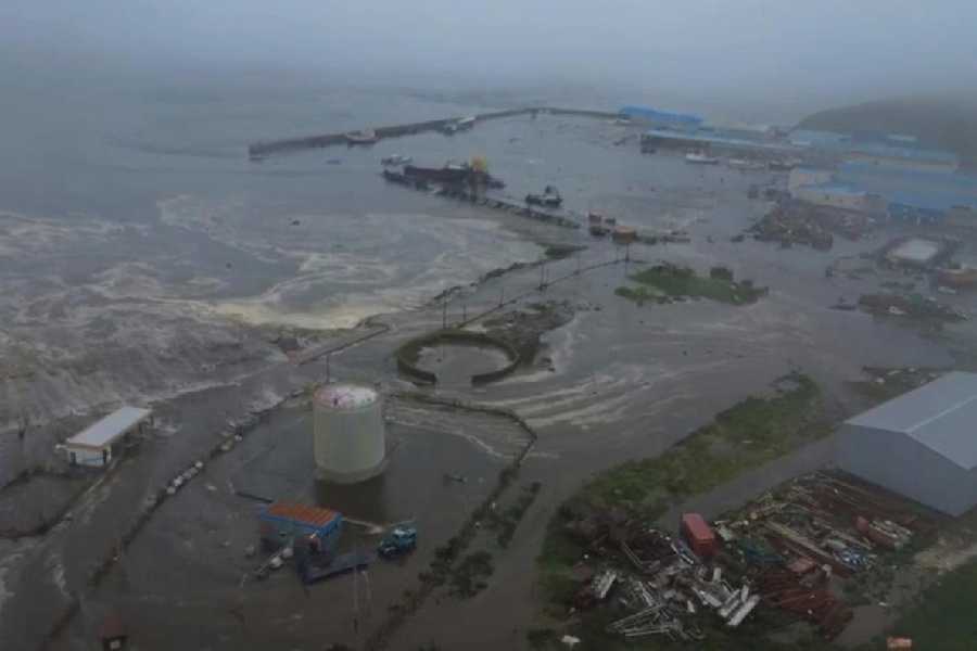 This image taken from a video released by Geophysical Service of the Russian Academy of Sciences, shows the aftermath of tsunami hitting the coastal area of Severo-Kurilsk at Paramushir island of Kuril Islands, Russia, Wednesday, July 30