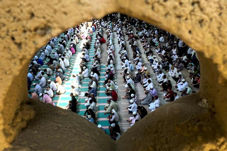 People offer ‘namaz’ on the occasion of ‘Eid-ul-Azha’ festival, at the Jama Masjid, in Nagpur, Maharashtra.