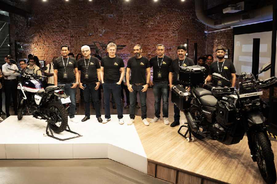 The Classic Legends team (l-r) Sharad Agarwal, chief business officer; Lalit Verma, COO; Boman Irani, co-founder, Anupam Thareja, co-founder, founder; Pradeep Deulkar, lead deisgner; Susheel Sinha, head of R&D; and Akhilesh Manchandani, lead designer, with the 2025 Yezdi Adventure