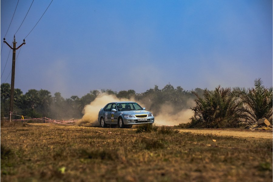 Areeb Rahman letting dirt fly as he revs his 2001 Honda City