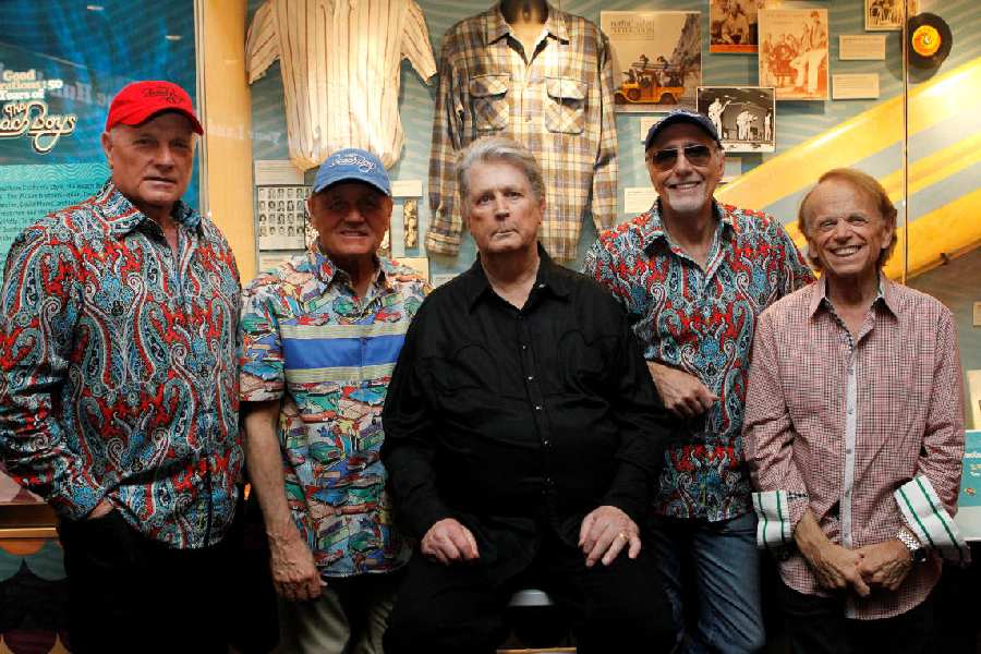 The Beach Boys (Mike Love, Bruce Johnston, Brian Wilson, David Marks and Al Jardine) pose during the opening night of their special exhibit at the Grammy Museum in Los Angeles in 2012