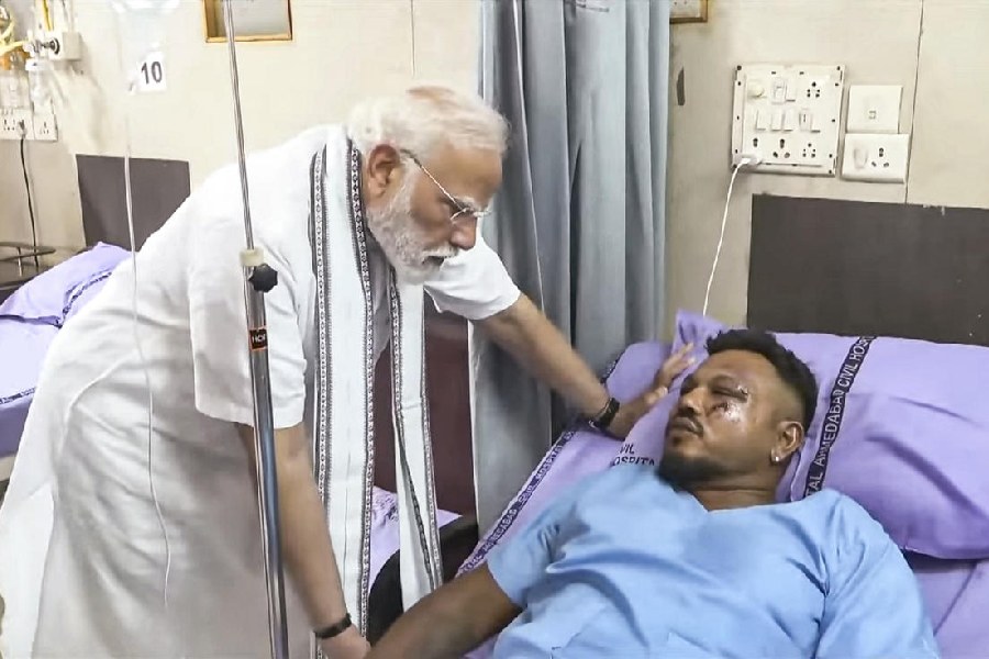 Narendra Modi meets Vishwash Kumar Ramesh, the lone survivor of Thursday's Air India plane crash, at a hospital, in Ahmedabad