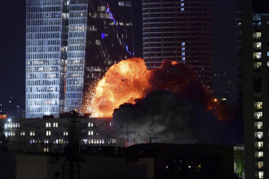 An explosion is seen during a missile attack in Tel Aviv