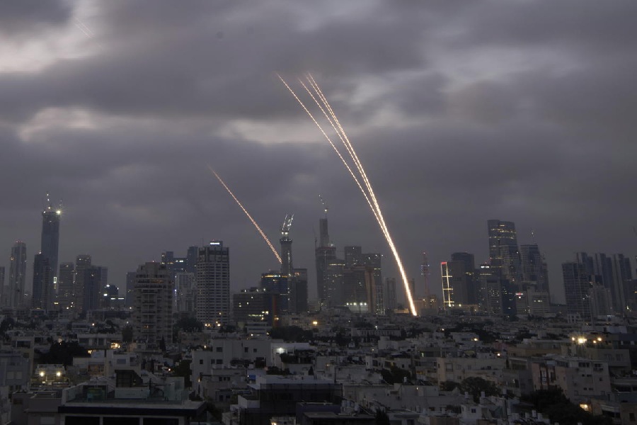 Israeli Iron Dome air defense system fires to intercept projectiles over Tel Aviv
