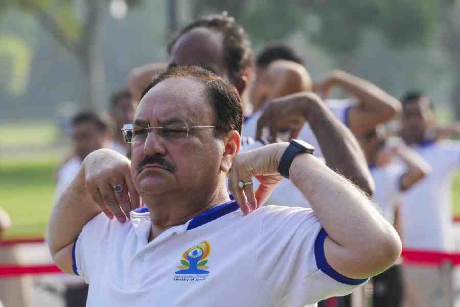 Union Minister and BJP National President JP Nadda takes part in a yoga session, organised on the International Day of Yoga, at the lawns of Kartavya Path in New Delhi, Saturday, June 21