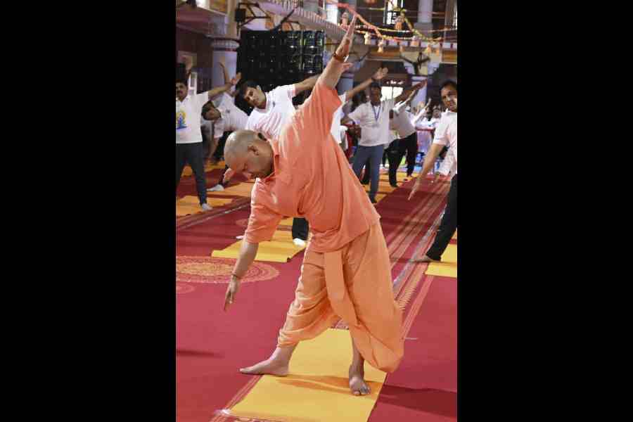 Uttar Pradesh Chief Minister Yogi Adityanath takes part in 'Mass Yoga Practice Program', organized on International Day of Yoga, in Gorakhpur, Saturday