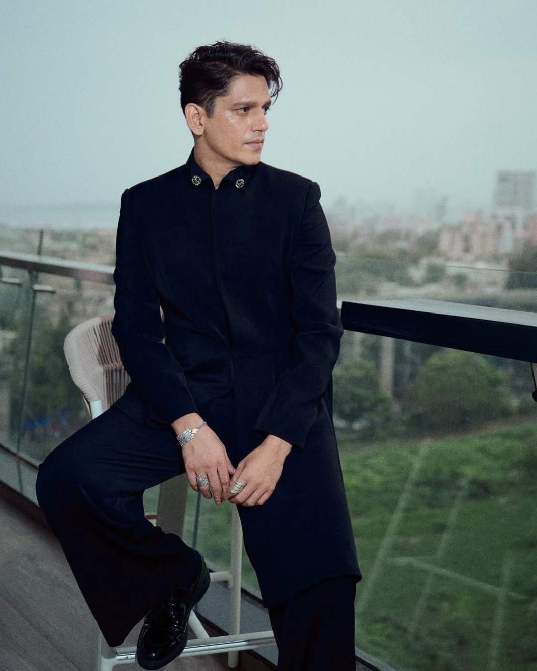 Vijay Varma attended the screening dressed in an all-black sherwani. 