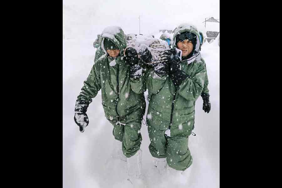 Army personnel conduct the rescue operation in Chamoli, Uttarakhand, on Friday.
