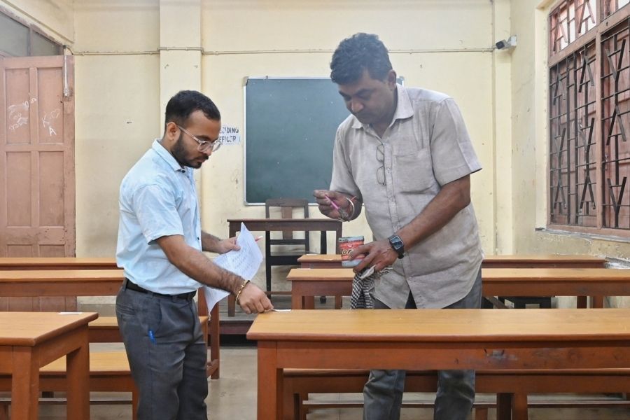Seating arrangements being made for students at Sanskrit Collegiate School on Saturday, as Higher Secondary exams begin from Monday 