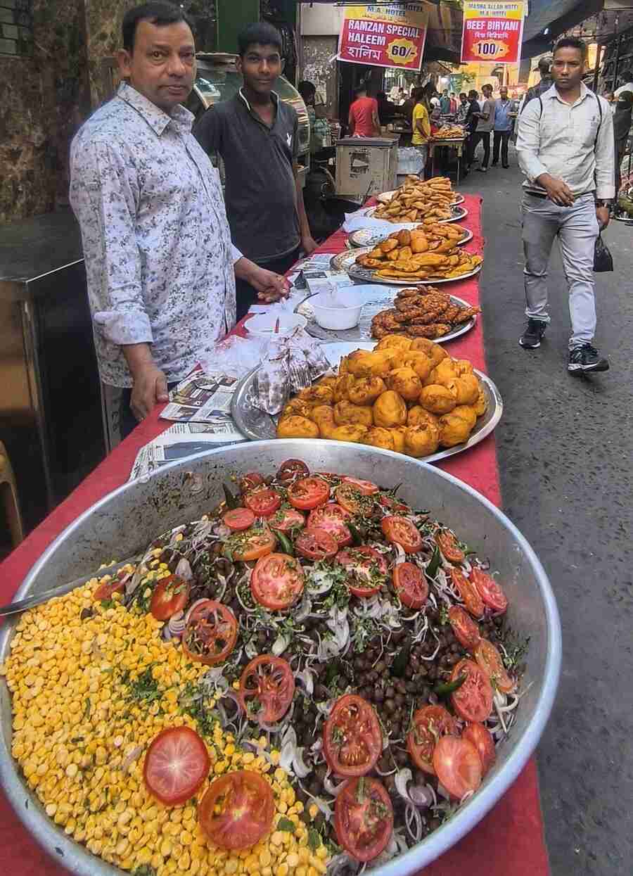 Food sellers line a central Kolkata road to help devotees break their fast (roja), on Monday morning  